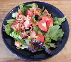 Hot Bacon Dressing over mixed Greens